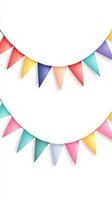 Colorful triangular pennants hanging against a plain white background for festive decoration and celebration photo