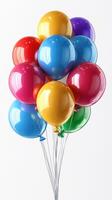 Colorful balloons in various shades floating together for a festive celebration setting indoors photo