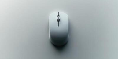 Mouse positioned on a smooth surface with a shadow cast in soft light during daytime photo