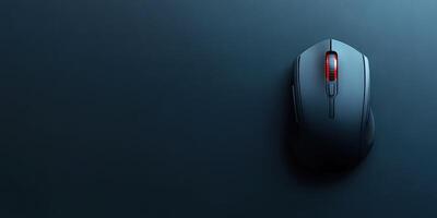 High-performance gaming mouse resting on a smooth black surface with a vibrant red scroll wheel photo