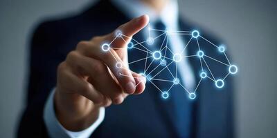 Business professional using interactive technology to connect digital nodes in a modern office setting photo
