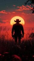 Silhouette of a cowboy against a vibrant sunset in an open field during golden hour photo