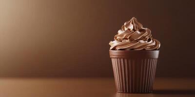 Delicious chocolate cupcake topped with creamy frosting against a soft brown backdrop photo