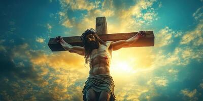 Crucifixion representation at sunset with dramatic clouds and golden light in the background photo