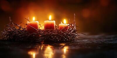 Warm glow of red candles nestled in twigs creates a cozy ambiance in a dimly lit setting photo