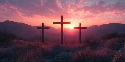 Beautiful sunset backdrop with three crosses on a hilltop near mountains during twilight hours photo