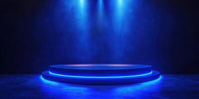 Blue illuminated circular stage with dramatic lighting in a dark setting for performances and events photo