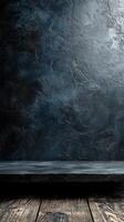 Textured black wall with wooden shelf creating a dramatic and elegant backdrop for display photo