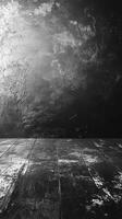 Background featuring textured dark wall and weathered wooden floor ideal for art displays or photography setups photo