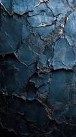 Dark blue textured wall with cracked paint showcasing depth and character in urban setting photo