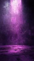 Vibrant purple textured backdrop with dramatic lighting creating an artistic atmosphere for creative endeavors photo
