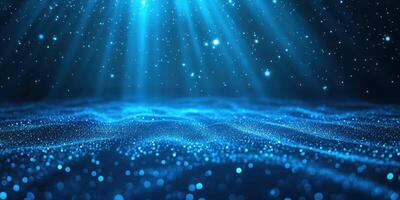 Glowing blue ocean waves illuminated by beams of light in a serene, tranquil underwater setting photo