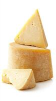 Delicious cheese display showcasing various triangular and round cuts in a bright setting photo