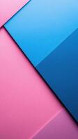 Colorful geometric shapes in pink and blue paper create an abstract arrangement in a modern design setting photo