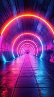 Colorful neon lights illuminate a long tunnel with a mesmerizing glow at night in an urban setting photo