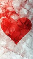 Bright red heart shape on marble background enhances a timeless romantic theme for artwork or designs photo