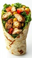 Fresh chicken wrap filled with lettuce, tomatoes, and corn garnished with grilled meat photo