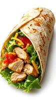 Delicious wrap filled with grilled chicken, fresh lettuce, and toppings on a tortilla photo