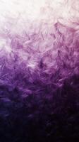 Colorful gradient background with a soft, textured appearance transitioning from light purple to dark violet photo
