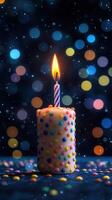 Brightly lit birthday candle with colorful sprinkles against a festive bokeh background photo