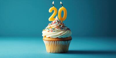 Celebrating a milestone with a colorful cupcake topped with a sparkling 20 candle in a festive atmosphere photo