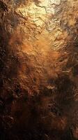 Textured surface with shimmering gold and black patterns reflecting light in a striking artistic design photo