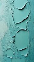 Paint layers peeling off a wall revealing textured surface beneath in a muted shade photo