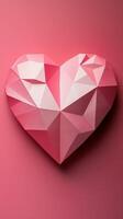 Pink geometric heart artwork displayed against a vivid pink background creating a striking visual effect photo
