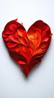 Intricate paper art heart crafted from layered red and orange shapes showcasing creativity and design techniques photo