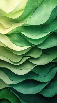 Colorful layered paper texture creating a flowing wave effect in varying shades of green and yellow photo