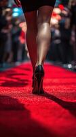 Elegant high heels stride confidently down the red carpet at a glamorous event in the evening photo