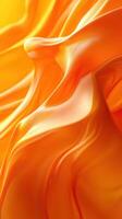 Flowing silk fabric in vibrant orange hues under soft light creates a warm, inviting atmosphere photo