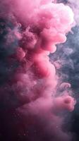 Colorful pink smoke rising in a mysterious, dreamy atmosphere filled with soft light and swirling patterns photo