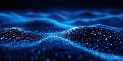 Digital representation of waves illuminated in blue with a glowing particle effect creating a mesmerizing visual landscape photo