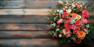 Beautiful flower arrangement on rustic wooden surface showcasing vibrant colors and diverse blooms for decoration or celebration photo