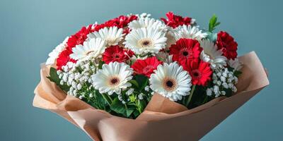 Beautiful bouquet of red and white flowers with greenery arranged elegantly for a special occasion photo