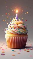 Colorful birthday cupcake with a lit candle and sprinkles on top in a festive setting photo