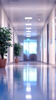 Modern office hallway with polished floors and plants located in a bright corporate environment photo