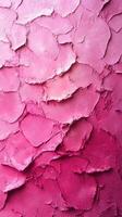 Textured pink plaster wall shows a gradient of colors from light to dark, creating an artistic backdrop for various settings photo