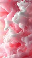 Colorful clouds of pink and white swirling together in a mesmerizing display of abstract forms and textures photo