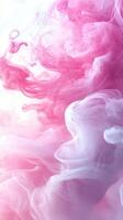Colorful swirls of pink and white smoke dance elegantly on a light background photo