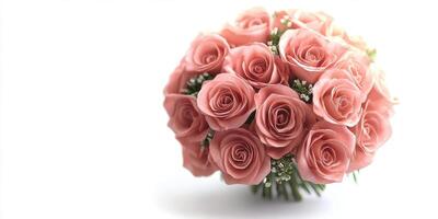 Beautiful bouquet of pink roses with delicate greenery arranged elegantly for special occasions photo