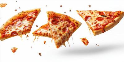 Pepperoni pizza slices floating in mid-air with melted cheese strands visible against a white background photo