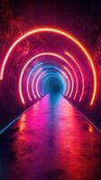 Colorful neon lights illuminate a tunnel creating a vibrant and futuristic atmosphere at night photo