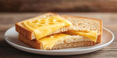 Slices of bread with melted cheese on a wooden table during casual mealtime photo