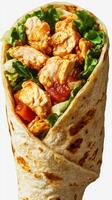 Delicious chicken wrap filled with fresh vegetables and spicy sauce served for a quick meal photo