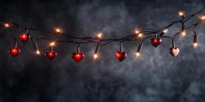 Romantic heart-shaped lights illuminate a dark background for a festive atmosphere during a celebration photo