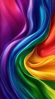 Vibrant silk fabric ripples in rainbow hues showcasing a colorful blend of textures and shades photo