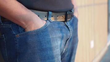 Casual style look featuring a belt and denim in an urban setting video