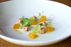 Decorative ingredients for a celery cream with mango, foie and g photo